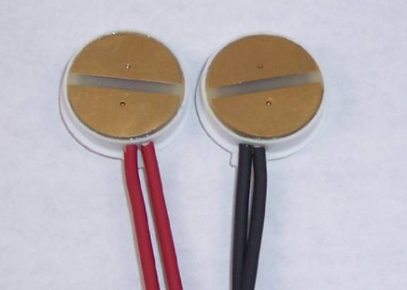 Non-invasive electrodes placed on the neck to measure the changes in vocal fold contact